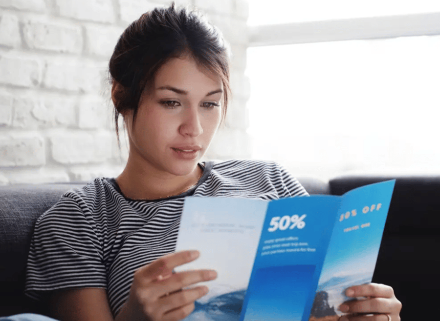 Woman reading brochure